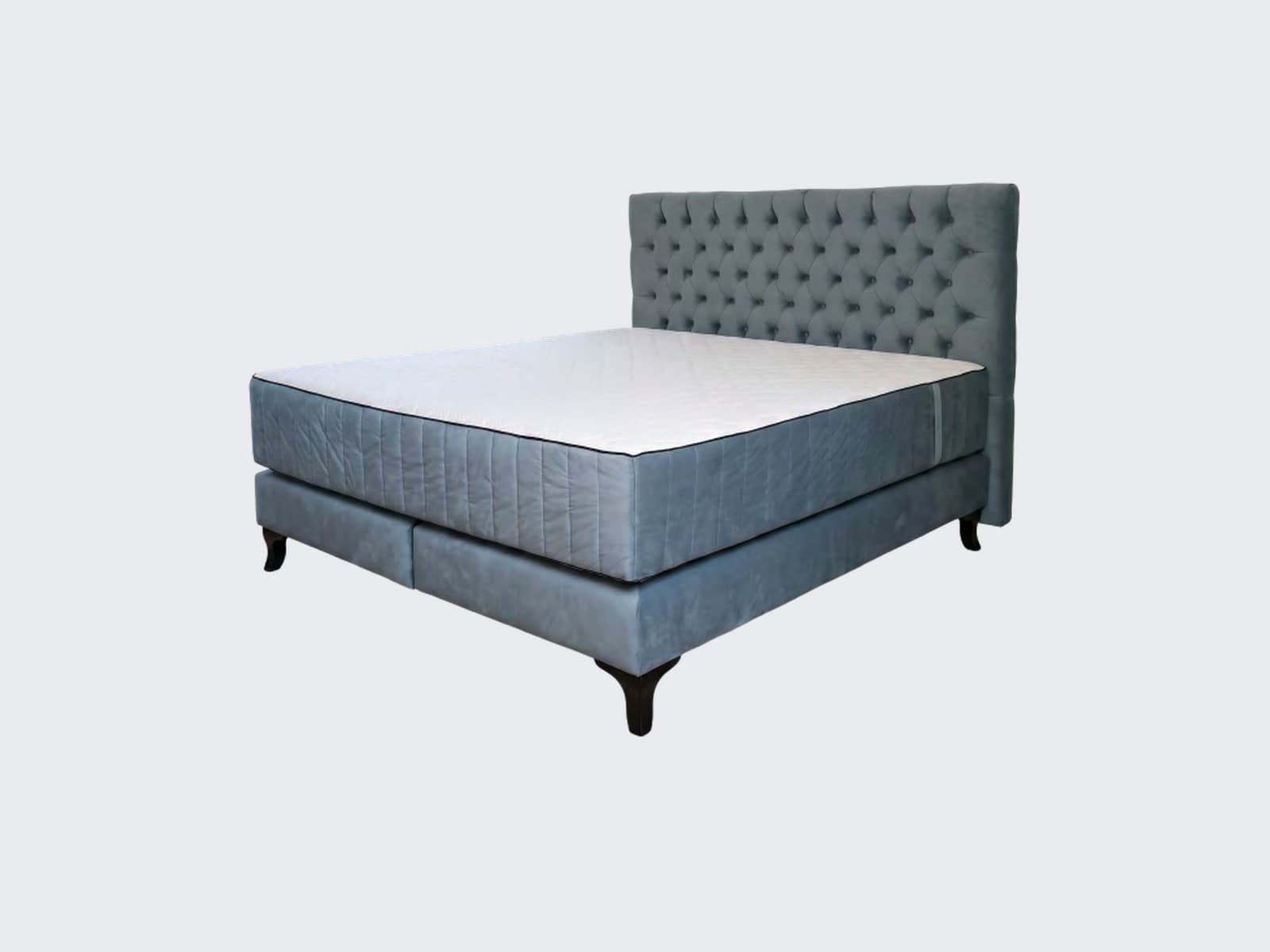 Łóżko Malaga kontynentalne z zagłówkiem — zwijany, pikowanie karo — widok z boku